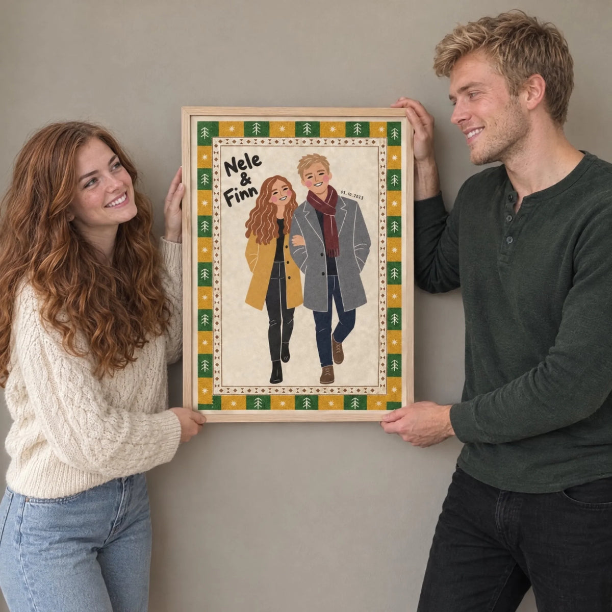 Paar hängt sein personalisiertes Poster auf